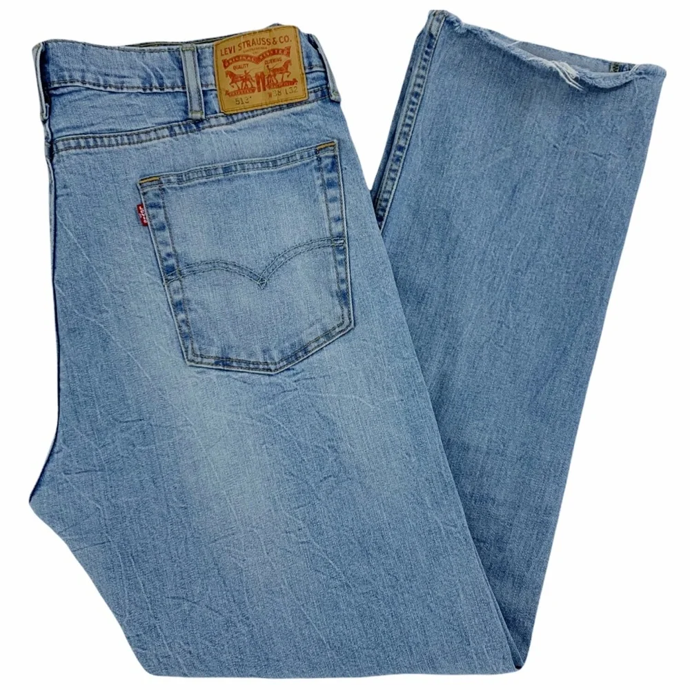 Levi’s 513 Slim Straight Distressed Light Wash Jeans